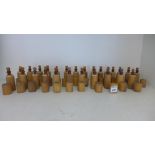 A collection of 26 brown glass bottles in wooden travel cases - all good - Height 7.