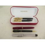 A fountain pen collection consisting of Sheaffer White Dot Lifetime,