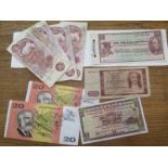 Five 10 Shilling notes, two 20 Dollar Australian notes, a 20 Zwanzig mark note,