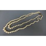 A graduated pearl necklace