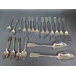 A collection of assorted silver flatware,