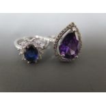 A sterling silver tear shaped amethyst dress ring and another silver dress ring - sizes N & L