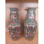 A pair of large late 19th century Famille rose vases - Height 64cm - repair to top of one and a