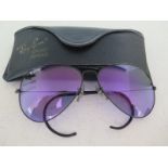 A collectable pair of USA made Rayban Sport Series sunglasses model W2455 with purple ace 30 lenses,