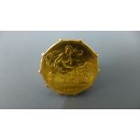 A half Sovereign dated 1915 set in a 9ct yellow gold ring mount - total weight approx 8.
