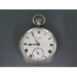 A hallmarked silver cased open faced pocket watch, Roman numerals to dial,