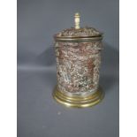 A copper and brass tobacco jar - originally plated - Height 16cm