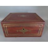 A mahogany and brass inlaid box central brass cartouche engraved S. Redding - Height 10cm x 21.