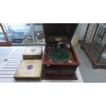 A Dulceola mahogany wind up table top gramophone with a collection of 68 78rpm records in working