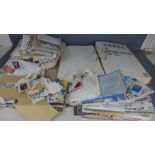 An album or file containing World stamps, a quantity of loose stamps and Airmail envelopes,