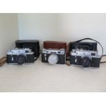 Three Zorki 35mm cameras,