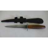 A Tropical Issue Commando Knife in later leather sheath - blade length 16cm,