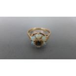 A 9ct yellow gold opal and sapphire cluster ring - approx weight 2.