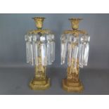 A pair of 19th century ormolu candlestick lustres - Height 32cm - chips and replacements to lustres,