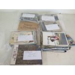 A large selection of postcards,