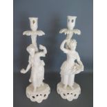 A pair of Blanc de Chine Victorian figural candlesticks Stevenson and Hancocks - Height 32cm - with