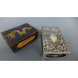 A Cloisonne dragon match box holder and a silver match box holder - some enamel missing to dragon