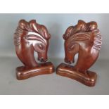 A pair of Art Deco wooden horse head book ends,