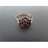A 9ct yellow gold ruby and diamond ring size L - approx weight 2.