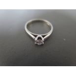 A platinum .950 and diamond solitaire ring size J - diamond approx 0.