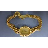 An 18ct yellow gold Chopard Geneve ladies wristwatch with rope twist triple bracelet numbered D
