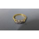 An 18ct yellow gold and three stone diamond ring - approx weight 2.