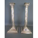 A pair of silver column candlesticks - London 1895/96 - Height 28.