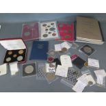 A collection of assorted coins including British, Roman,
