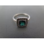 An Art Deco design 9ct white gold emerald and diamond ring size M - approx 2.