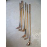 Six vintage Hickory shafted golf clubs including four woods one entitled The St Andrew - one short