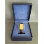 A Corum gentleman's 18ct yellow gold wristwatch with 24ct yellow gold 15g dial number 1262 - manual