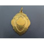 A 9ct yellow gold fob pendant - approx weight 3.