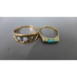 A 10ct yellow gold ring with turquoise and opal to shoulder - one opal missing,