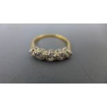 An 18ct gold and platinum five stone diamond ring - total approx diamond weight 0.
