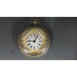 A ladies silver cased pocket watch in .