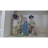 A Lladro group - Two Female water carriers - repair to urn - and a seated figure Sanisidro no 452