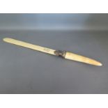 A Victorian ivory letter knife with silver collar and tusk handle,