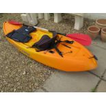 An Ocean Kayak Yak Bokro with life jacket,