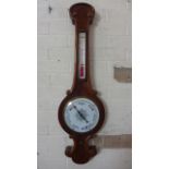 A 19th century mahogany case barometer and thermometer Condition report: Working