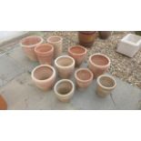 A set of ten assorted teracotta pots