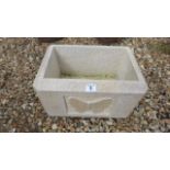 A Limestone planter with carved butterfly on front and chamfered sides - Height 25cm x 38cm x 26cm