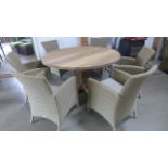 A Bramblecrest Kuta 145cm round table with six armchairs