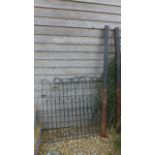 A pair of iron garden gates - Width 115cm x Height 124cm - with steel posts