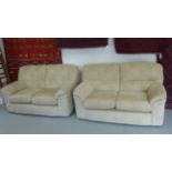 A pair of modern two seater sofa's in multi-tone beige fabric - Width 153cm each Condition report: