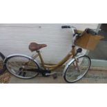 A Dawes Continental ladies seven speed bike with basket and Dynamo lights - hardly used