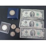 Five Foreign coins and three two Dollar notes