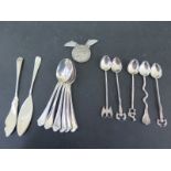 Six silver teaspoons, two silver knives,