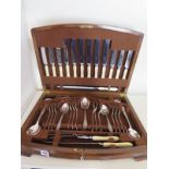 A walnut canteen of plated cutlery - 6 setting