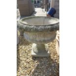 A reconstituted stone garden urn with plinth base - Diameter 60cm x Height 57cm