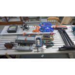 A quantity of tools including clamps, a vice, a Bosch jigsaw,